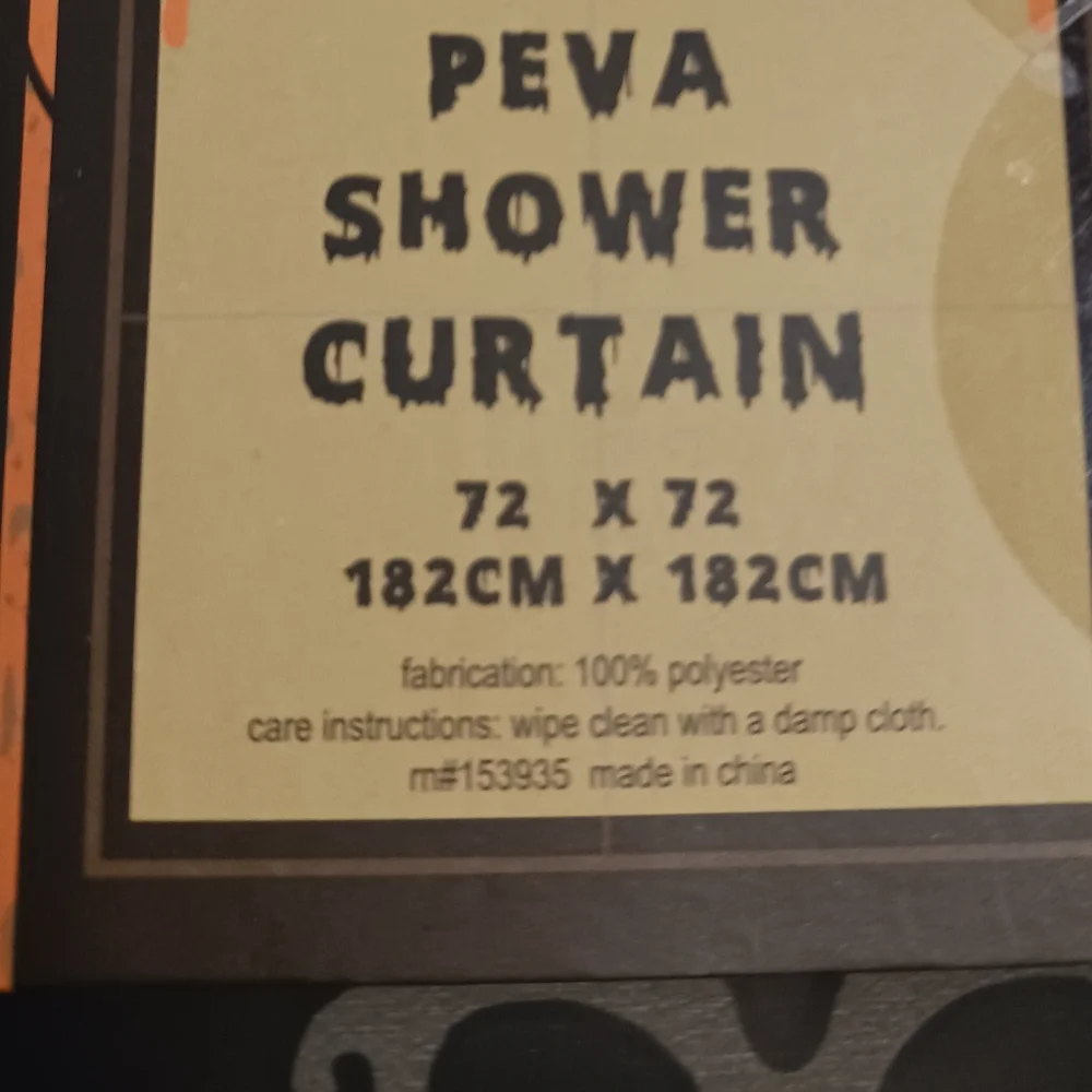 Shower liner black with gray skulls and crossbones print